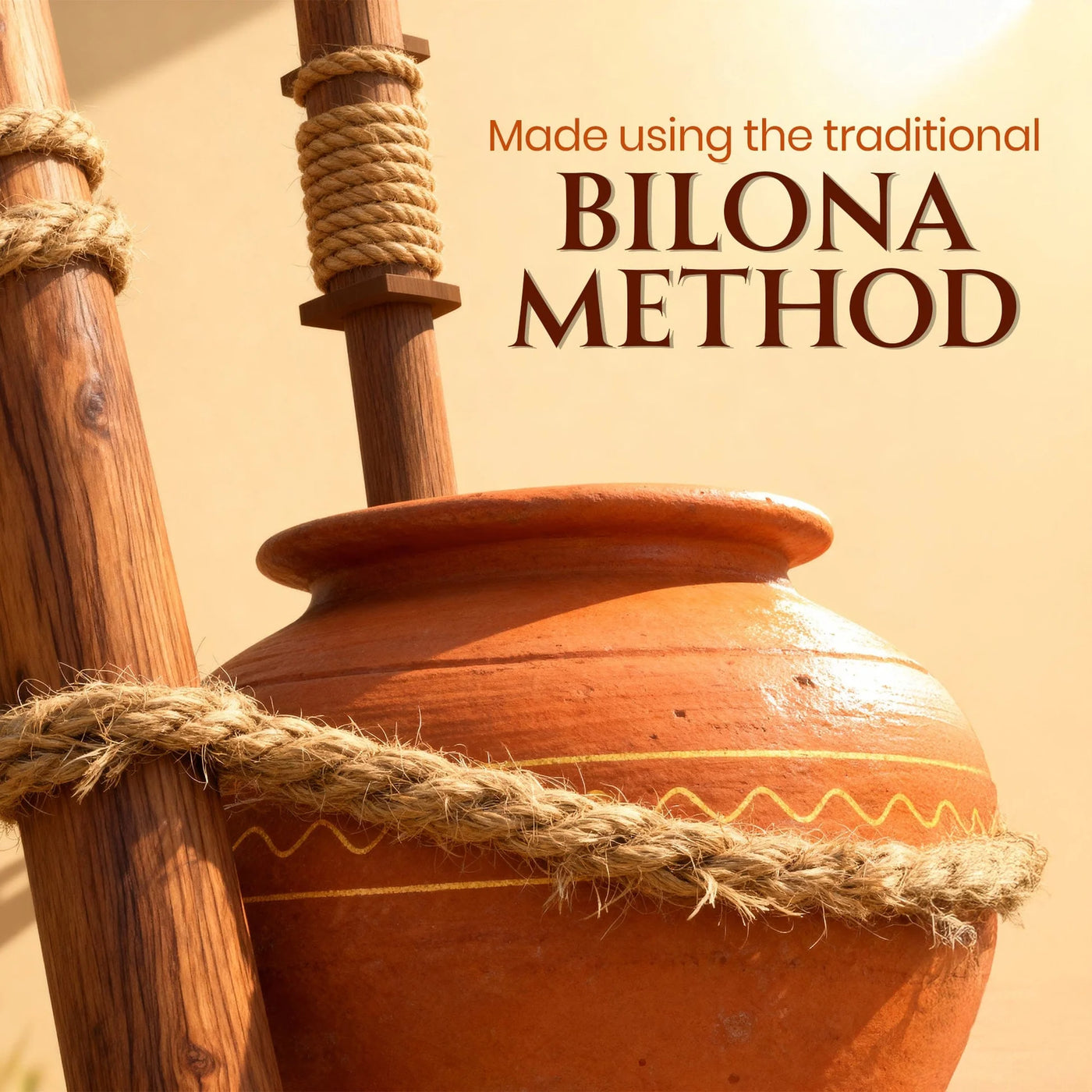 Terracotta pot and rope-bound wooden churner: made using the traditional bilona method
